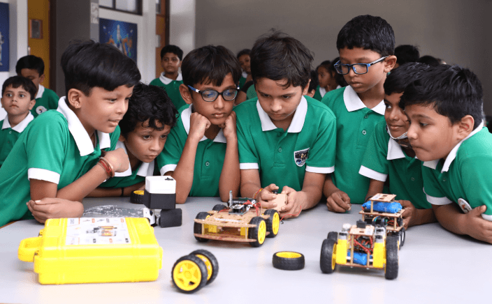 Students exploring AI & Robotics kits
